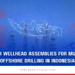 Modular offshore wellhead assembly installed on an Indonesian rig deck.